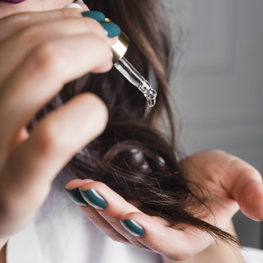 the beauty of applying hair serum, a luxurious elixir that pampers your locks with care.